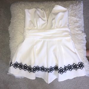 White Romper With Black Detail on bottom